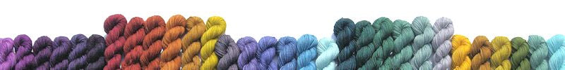 Skeins of yarn from the six pack gradient yarn collections